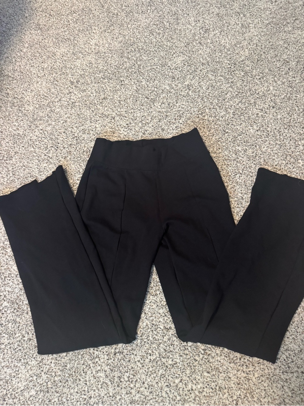Abercrombie & Fitch Black leggings with flared bottom.